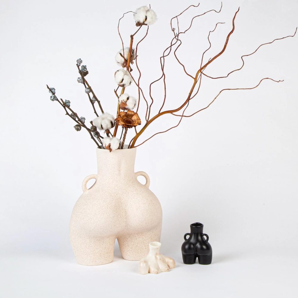 Anissa Kermiche ceramic body vases with dried cotton stems